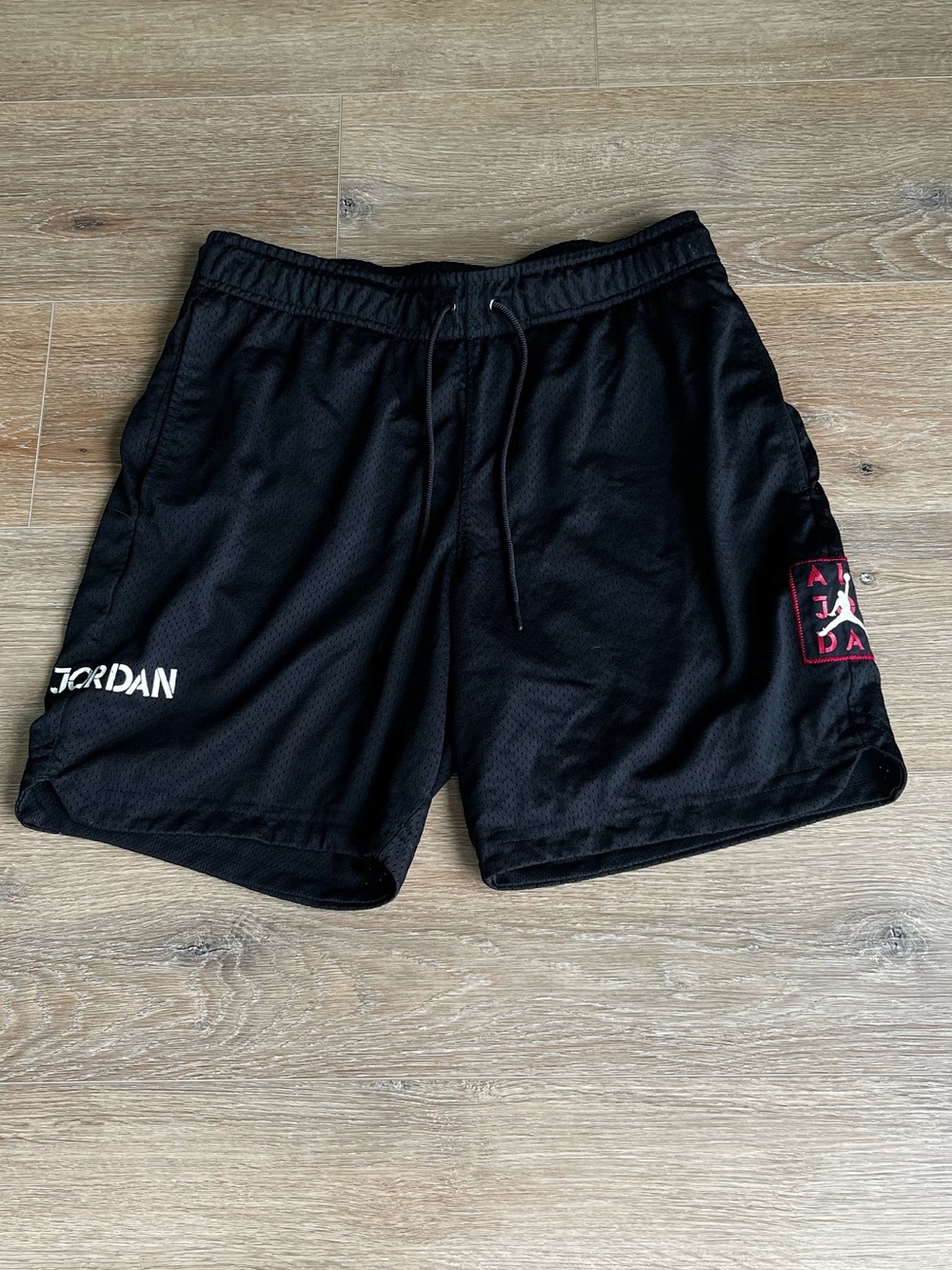 Jordan Black Athletic Mesh Shorts with Red Accent size S